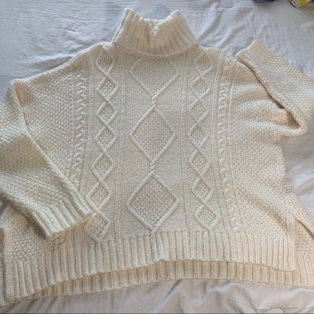 White cableknit sweater